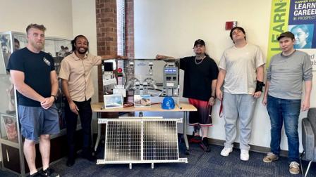 CPE students explore renewable energy using a solar demo unit at the Learning and Career Center in Prospect Heights