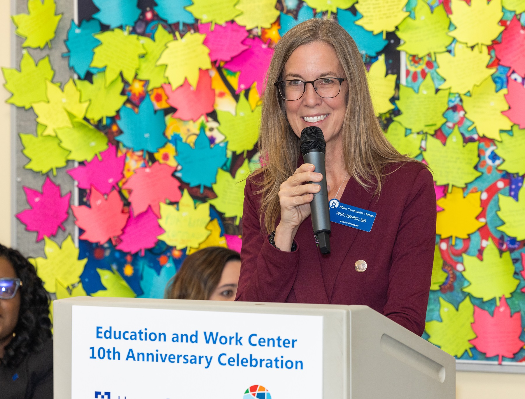 Dr. Peggy Heinrich, Elgin Community College interim president, speaks at EWC's 10th anniversary celebration.