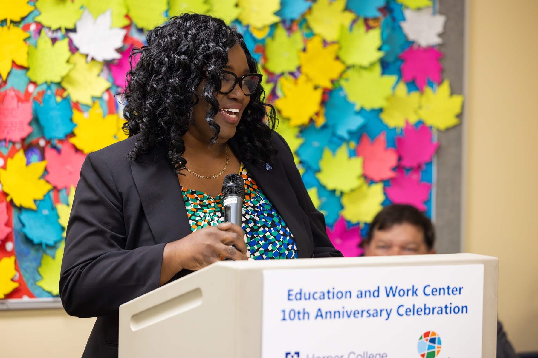 Dr. Avis Proctor, Harper College president, speaks at the EWC 10th anniversary celebration.