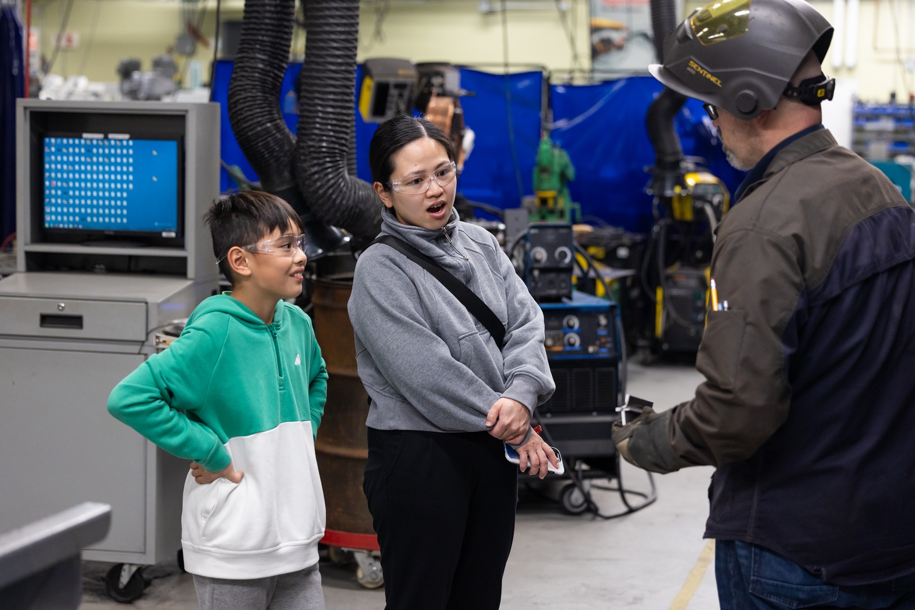 Visitors watch a demonstration during Experience Day