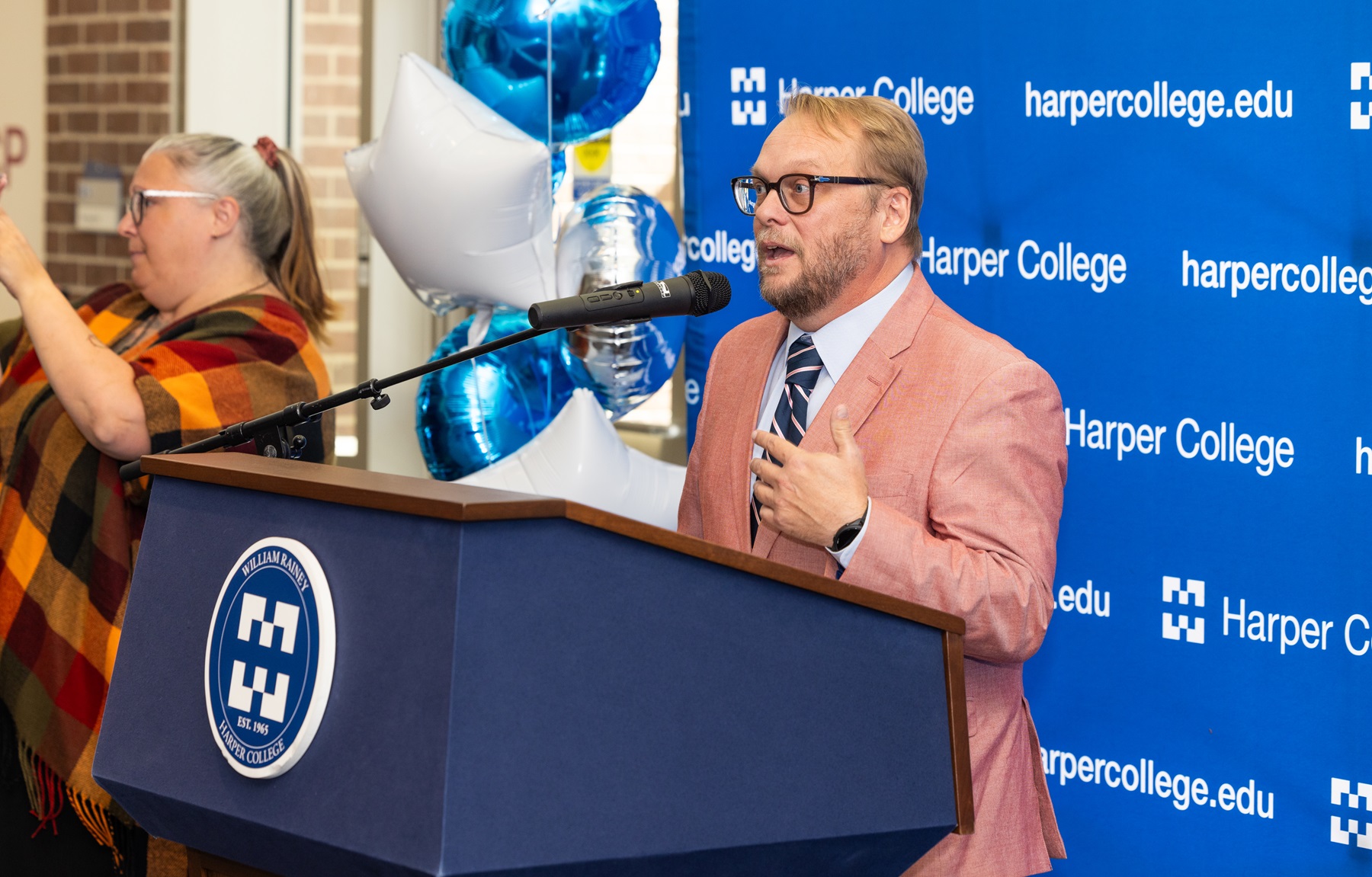 Associate Professor Brian Shelton speaks at the ribbon-cutting event for Harper's Film Lab