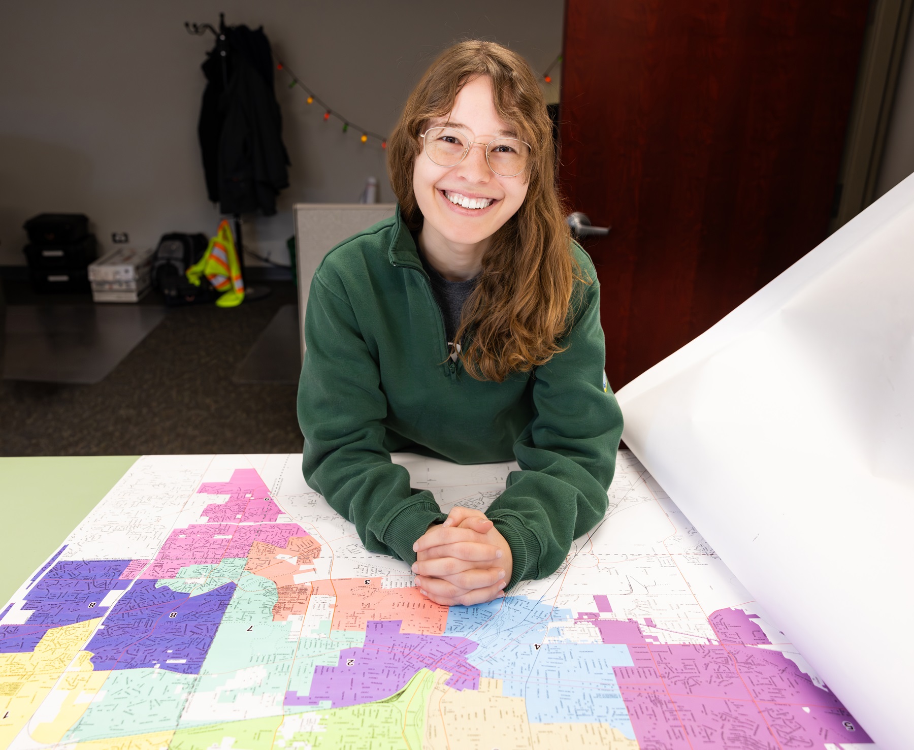 Carolina Szoepe works with maps in her role as a GIS project assistant