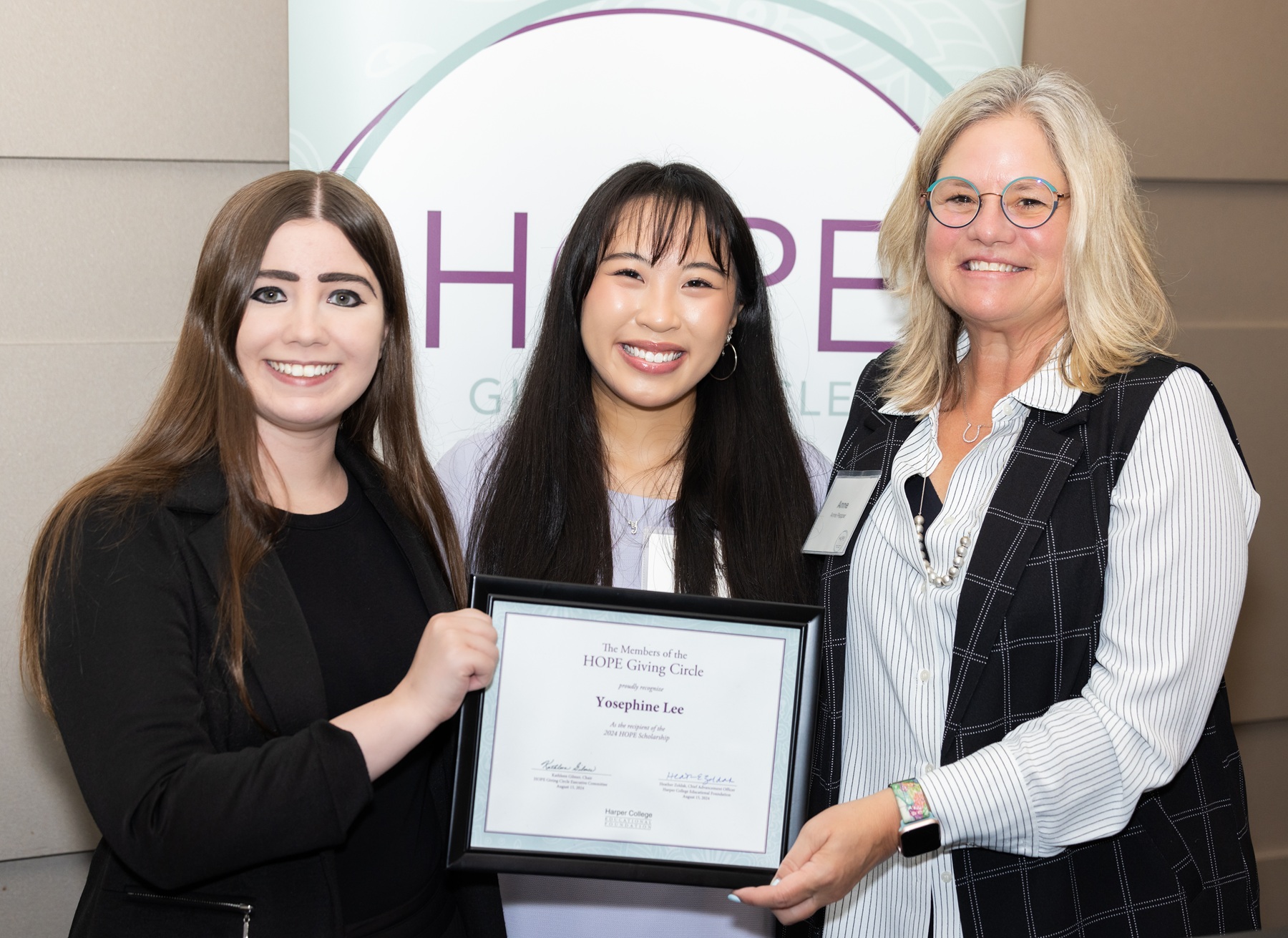 HOPE Giving Circle members stand with 2024 HOPE Scholarship Recipient Yosephine Lee