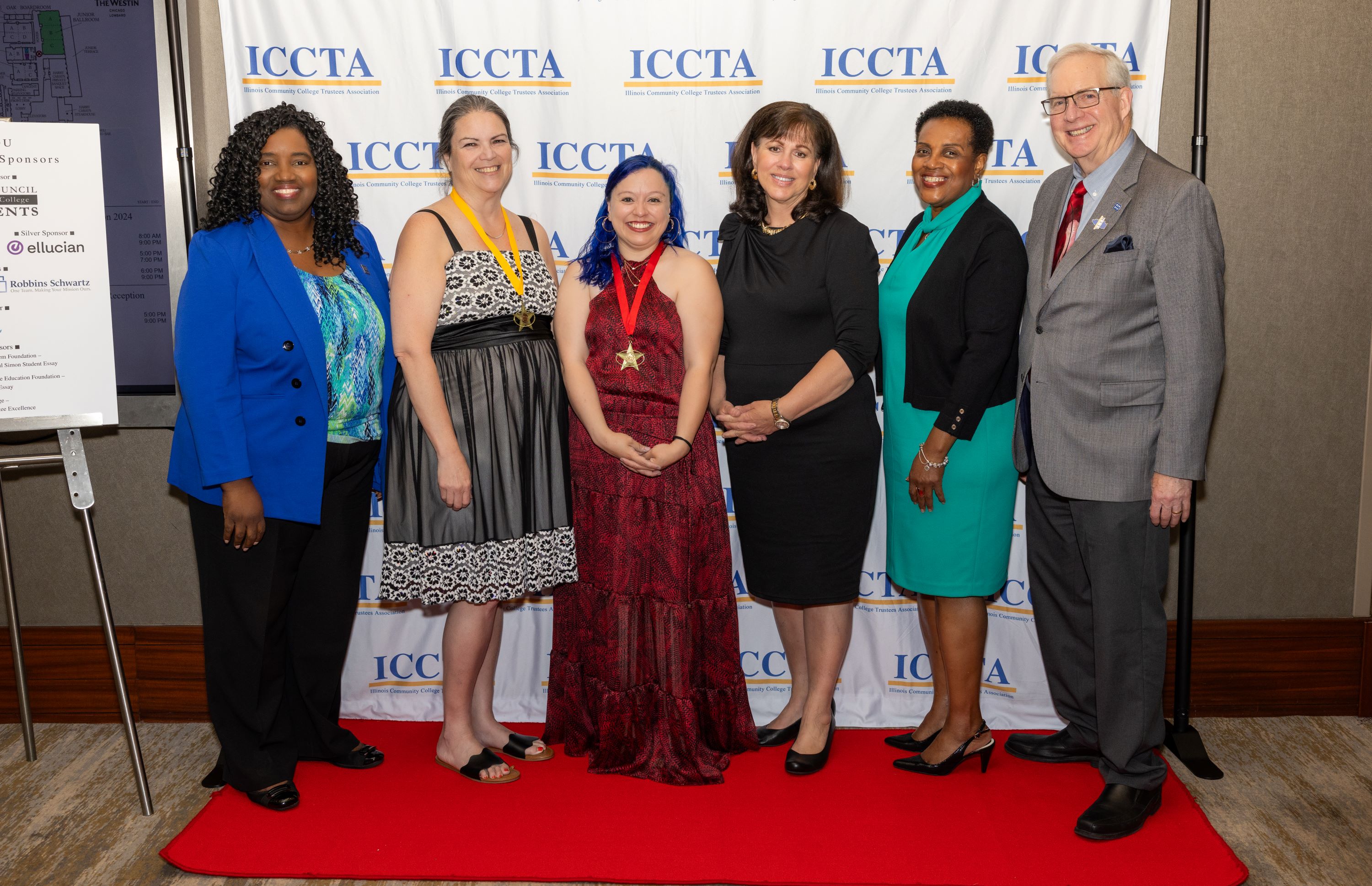 Photo of Harper's president and board chair with the honorees recognized at the ICCTA Awards