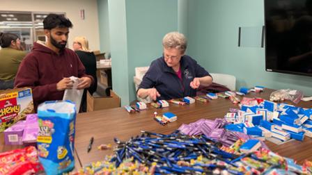 Students and employees pack thrive kits