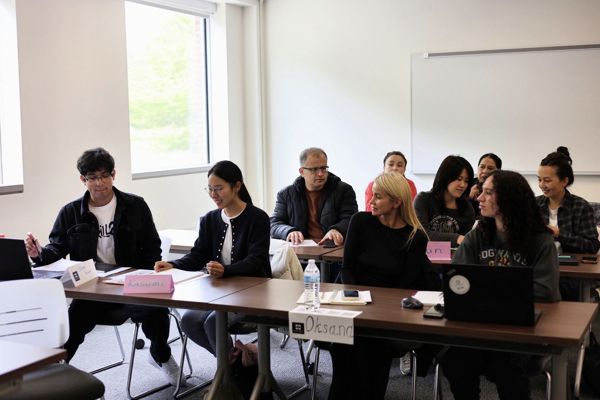 Harper College AED High School Equivalency Class Discussion Students in AED's High School Equivalency (HSE) program discuss and assignment in a classroom on the Harper College campus in Palatine, Illinois.