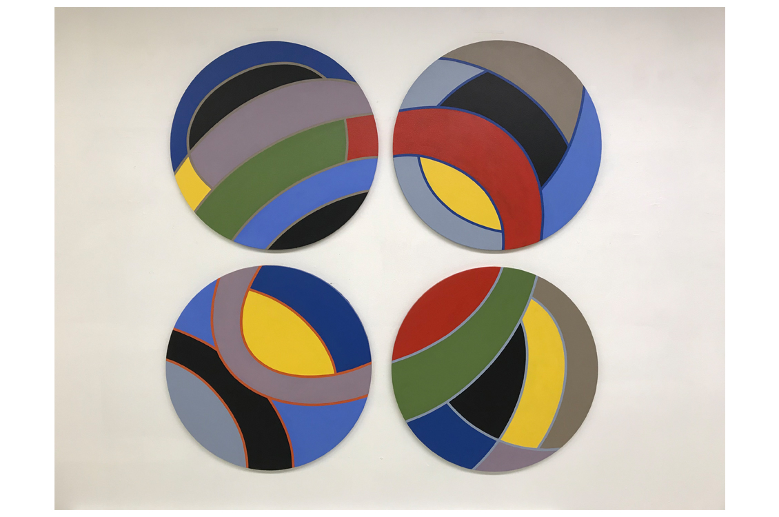 a series of four circular paintings with interlocking rings