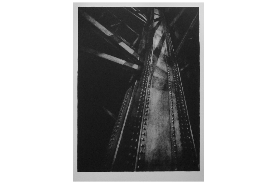 black and white photo of an iron girder