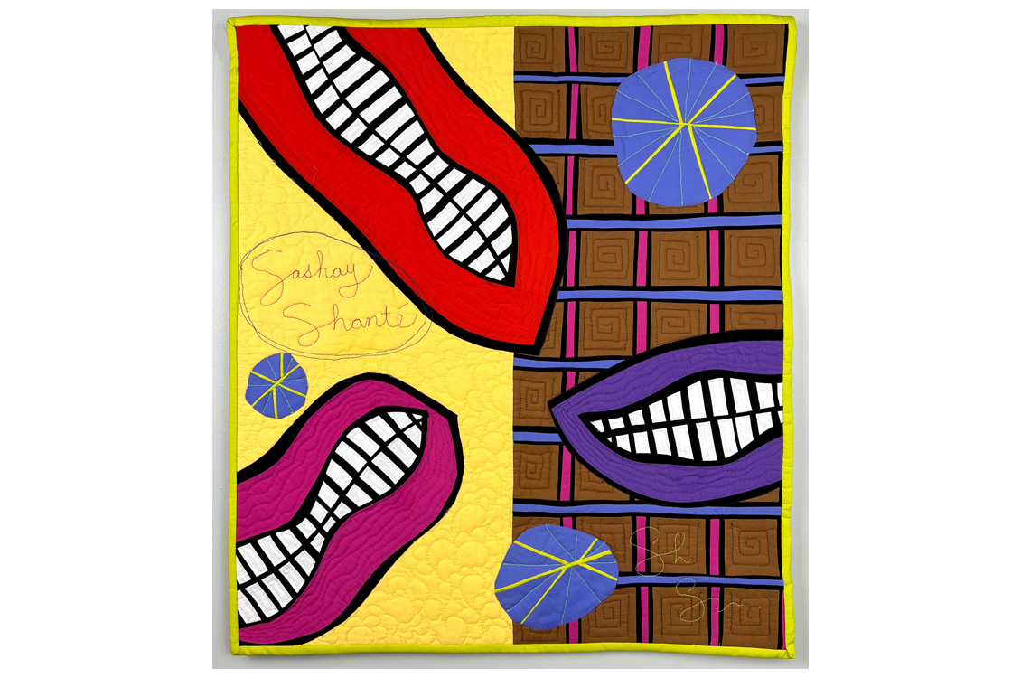 abstract textile piece with smiling lips showing teeth