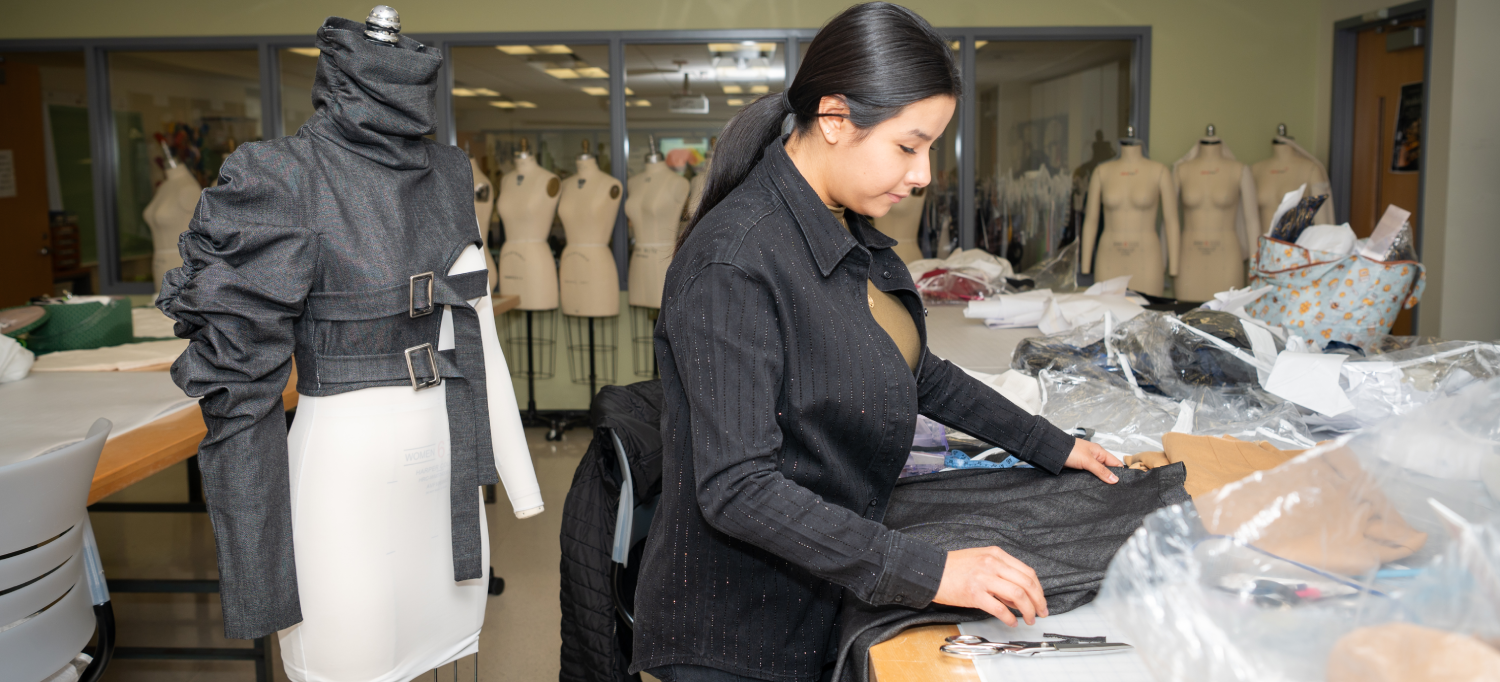 Student writing fashion notes