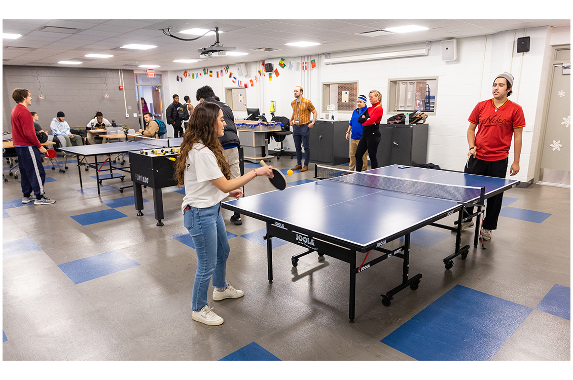 students playing ping pong