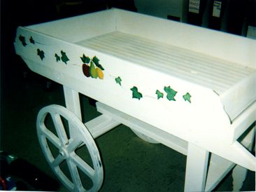 white wagon cart with a painter fruit pattern