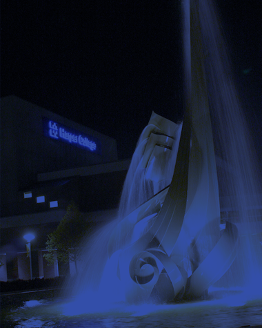 view of harper campus fountain at night
