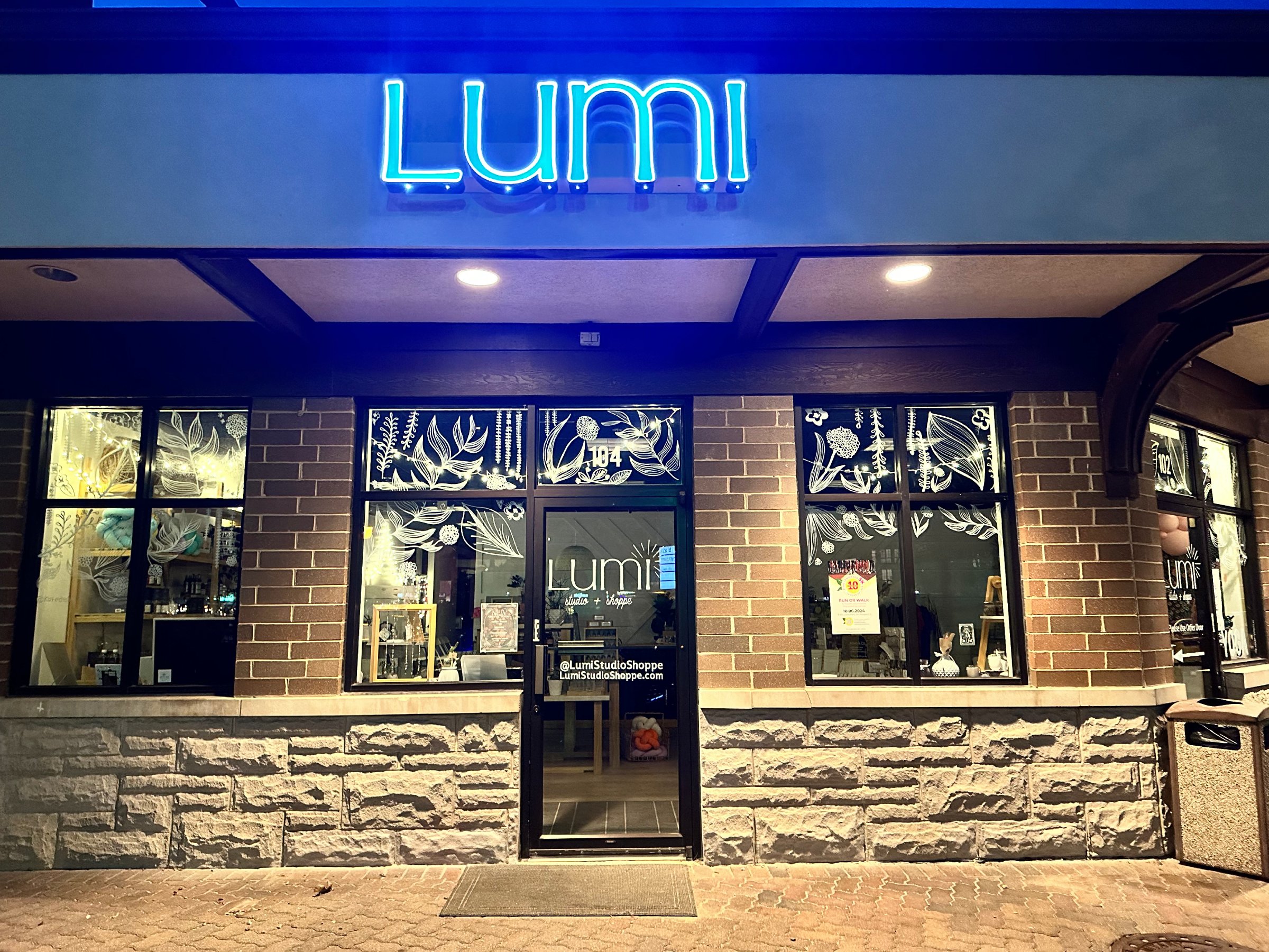 a frontal view of the exterior storefront of LUMI