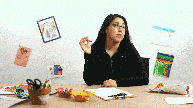 Karina Guillen sits at a test, twiddling a pencil in her left hand.