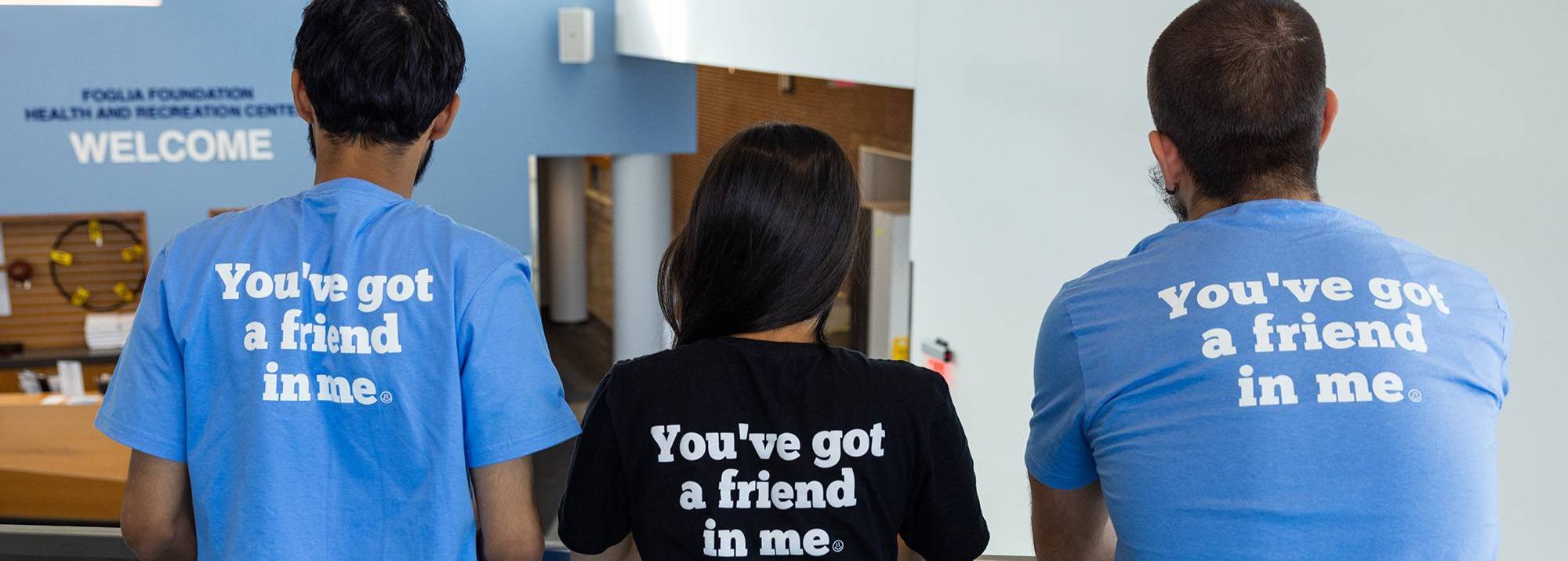 Students wearing shirts that say: You've got a friend in me